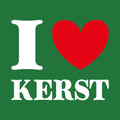 Groen tegeltje met witte tekst I love kerst en een rood hart