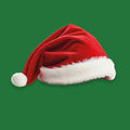 Groen tegeltje met een rode kerstmuts met witte rand en pompon