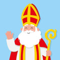 Lichtblauw tegeltje met een illustratie van een zwaaiende Sinterklaas met mijter en staf