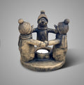 Waxinelichthouder Circle of Snowmen: kring van sneeuwpoppen rond een waxinelichtje, Majestic Brown, Ø16 x H15 cm